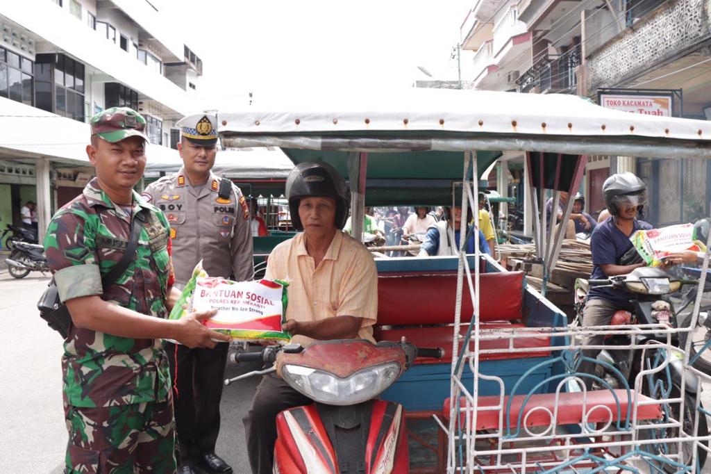 Personel Polres, Koramil dan Pemuda Pancasila Bagikan 250 Paket Sembako