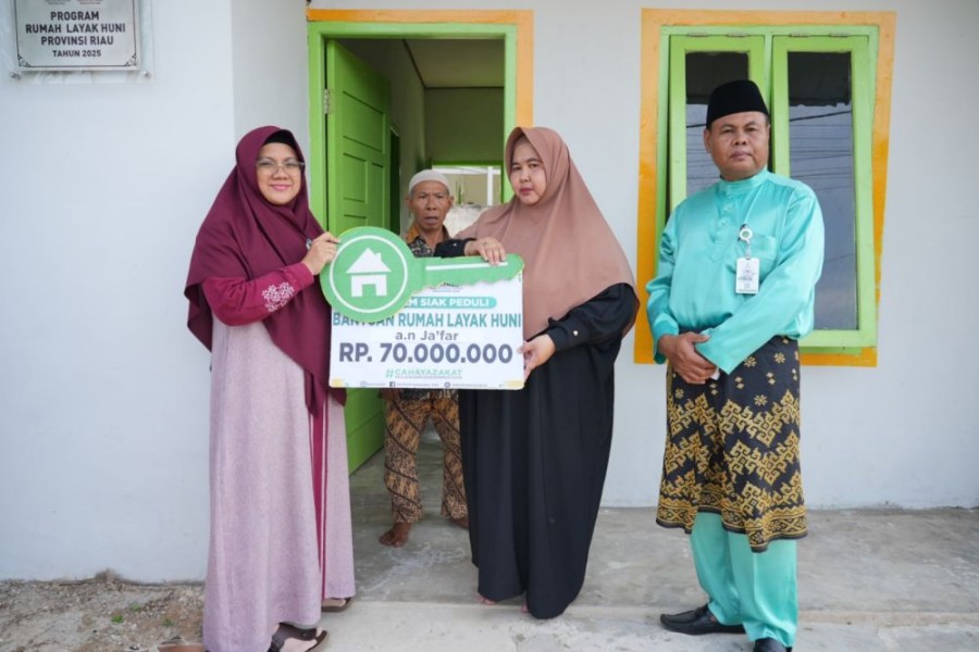 Di Bulan Penuh Berkah, Bupati Siak Serahkan Bantuan Rumah Layak Huni Baznas